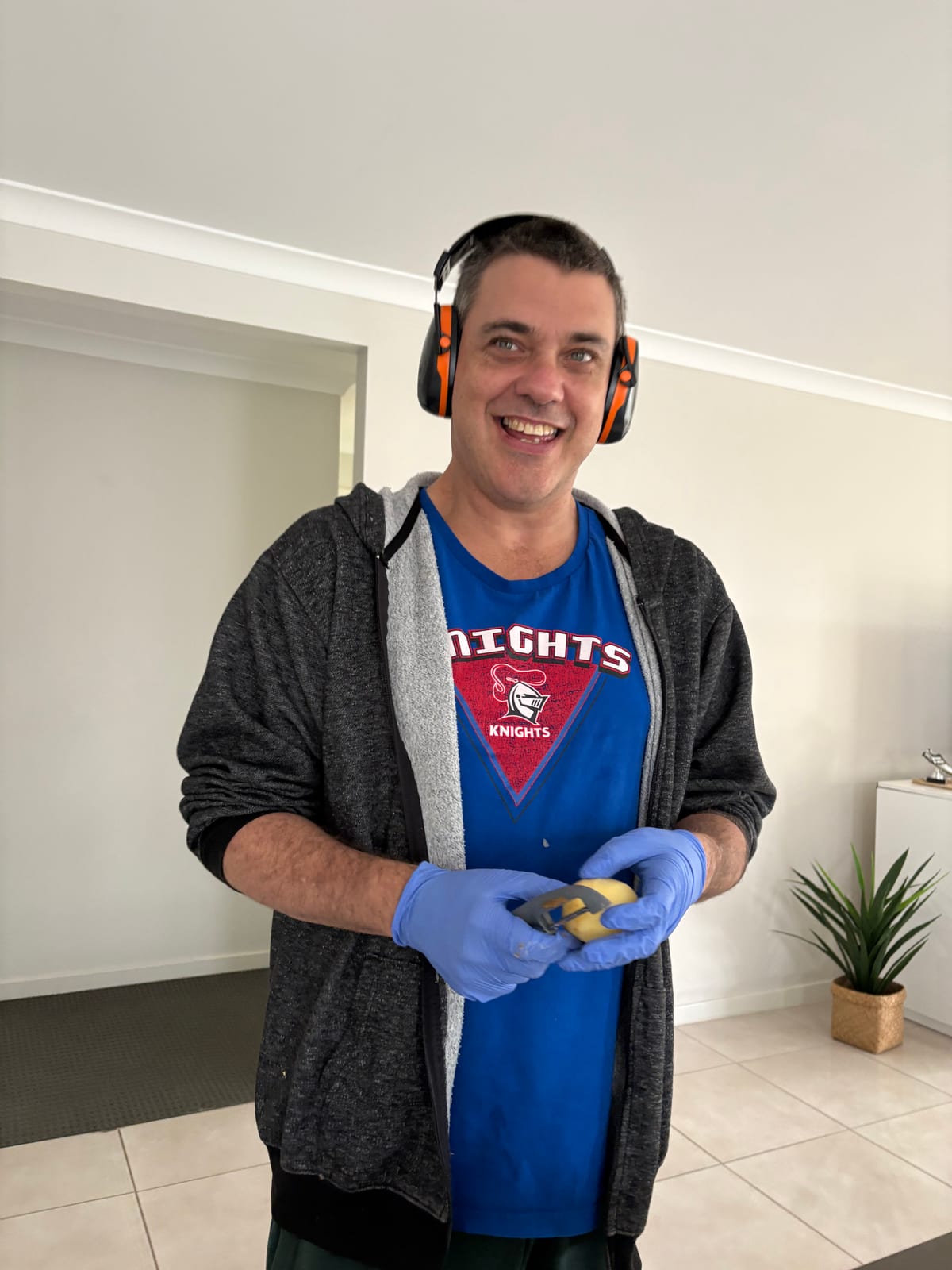 A participant smiling at home in one of the Sanctuary homes.